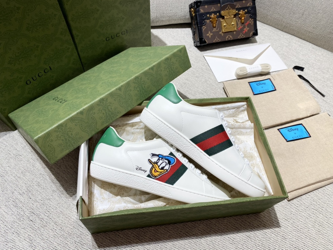 G*u*i sneakers