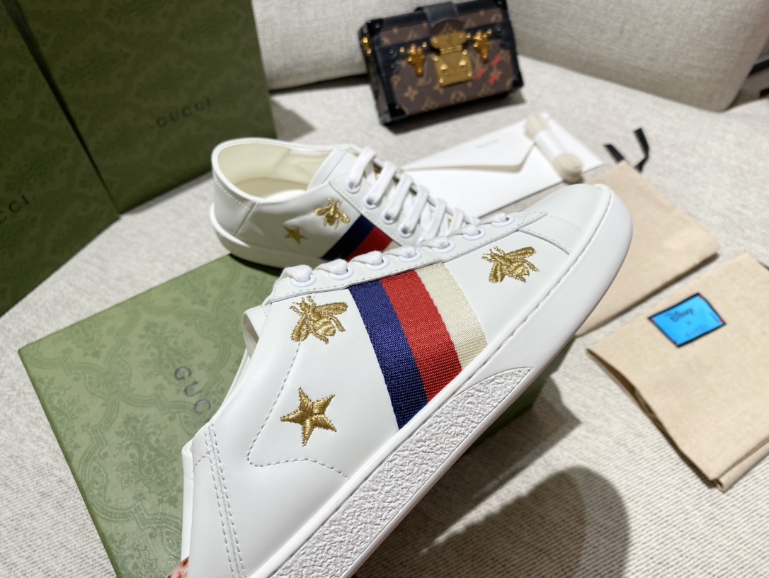 G*u*i sneakers