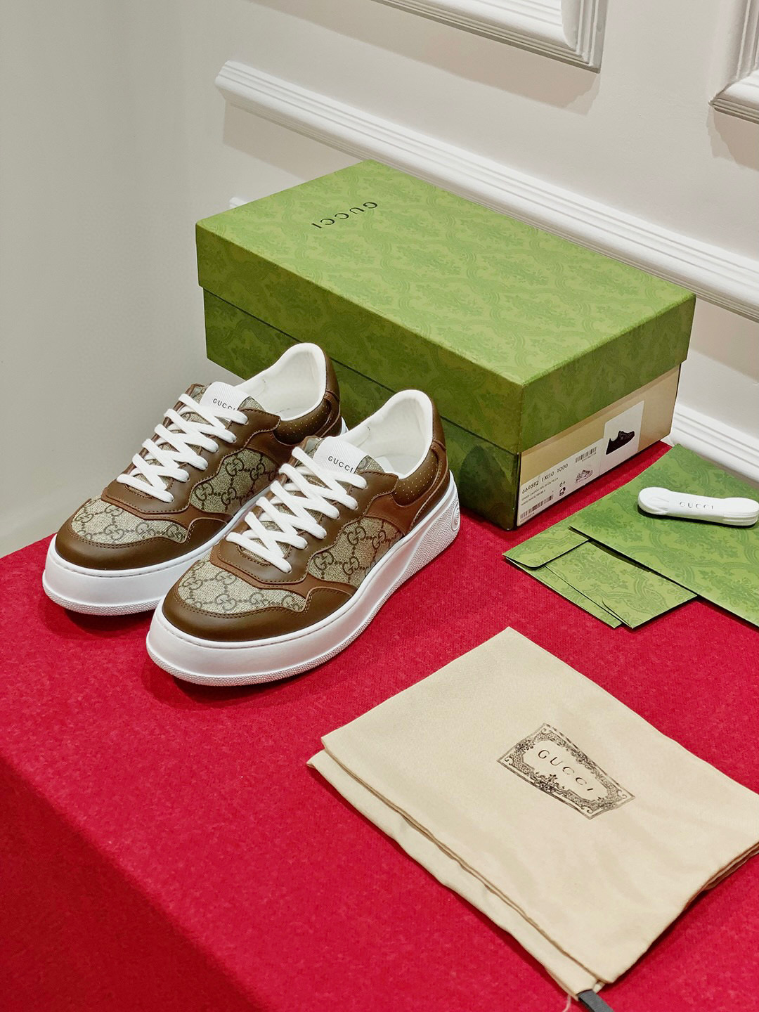 G*u*i sneakers