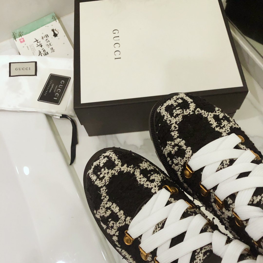 G*u*i boots