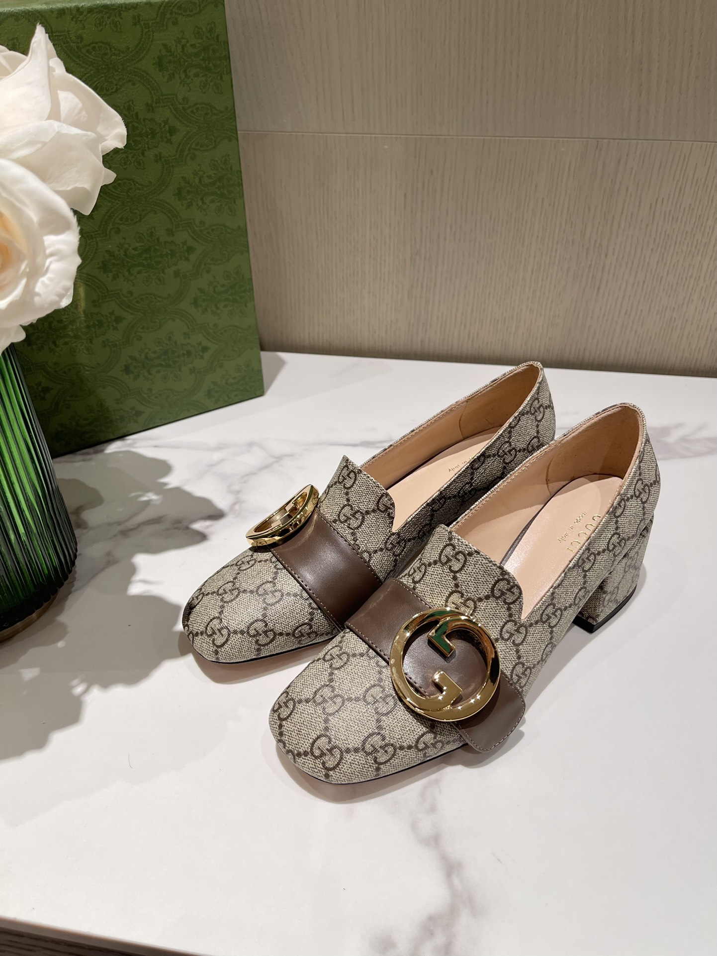 G*u*i loafers