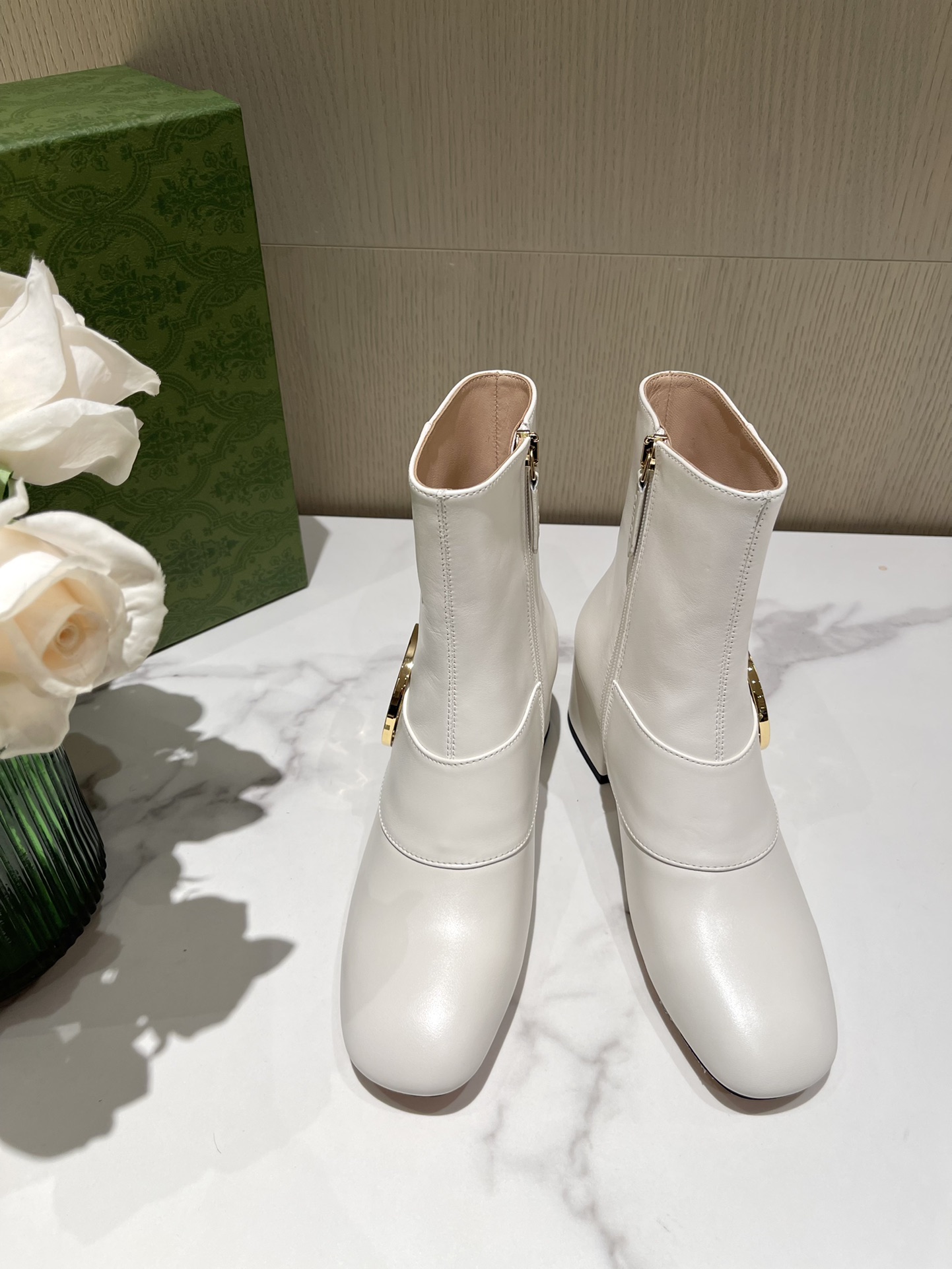 G*u*i boots