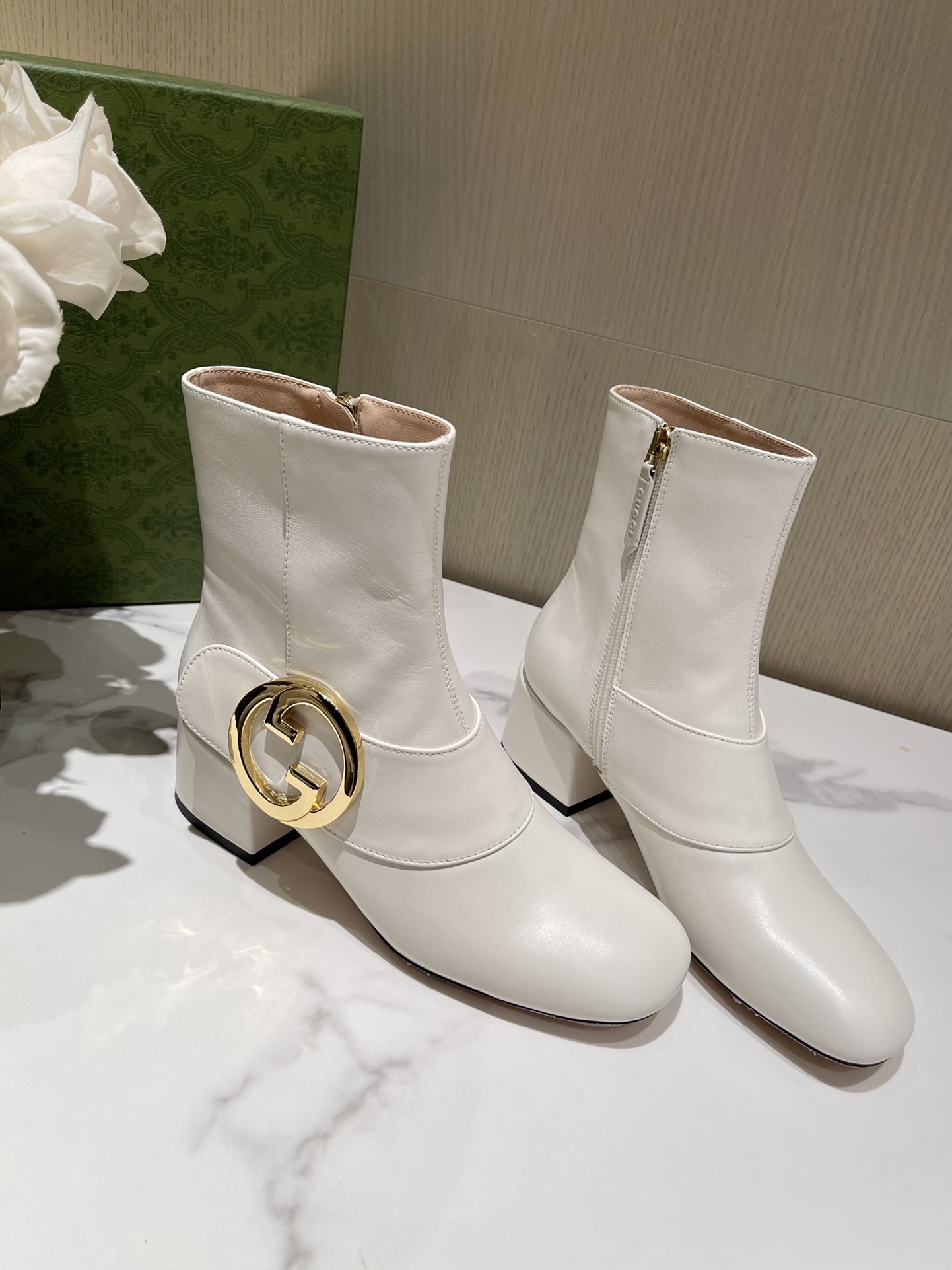 G*u*i boots