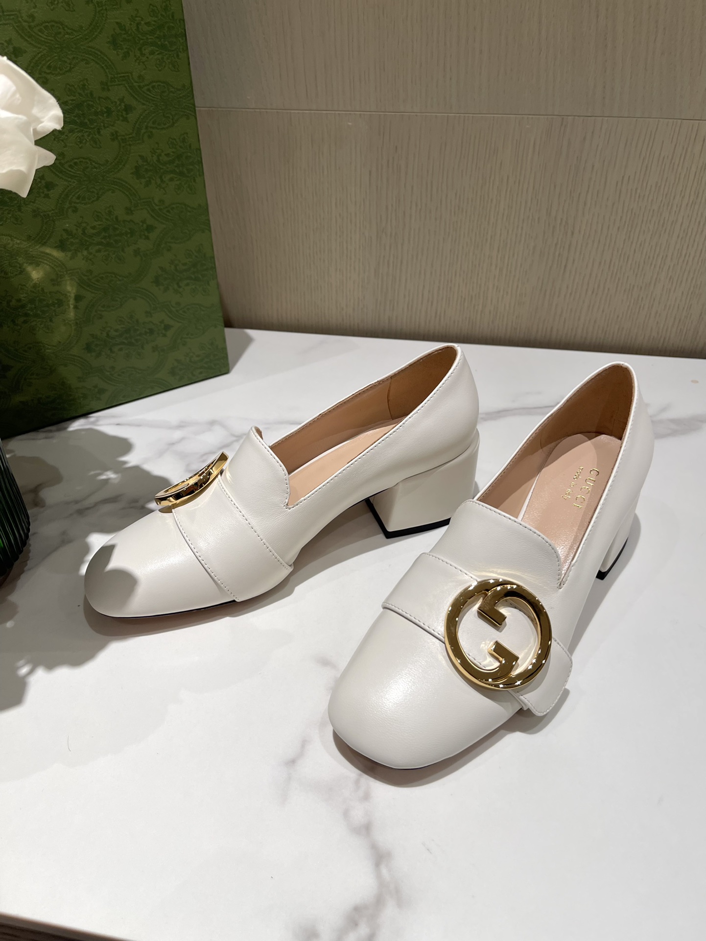 G*u*i loafers