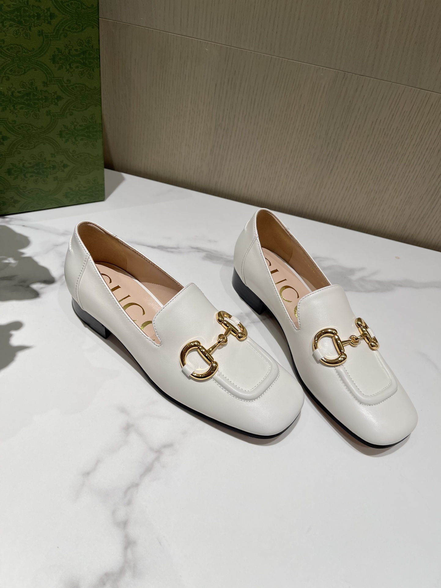 G*u*i loafers