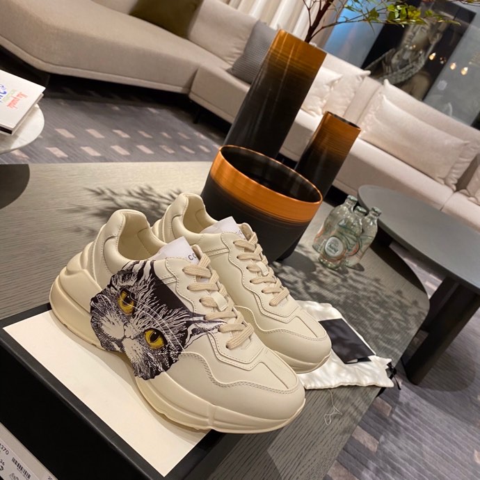 G*u*i sneakers