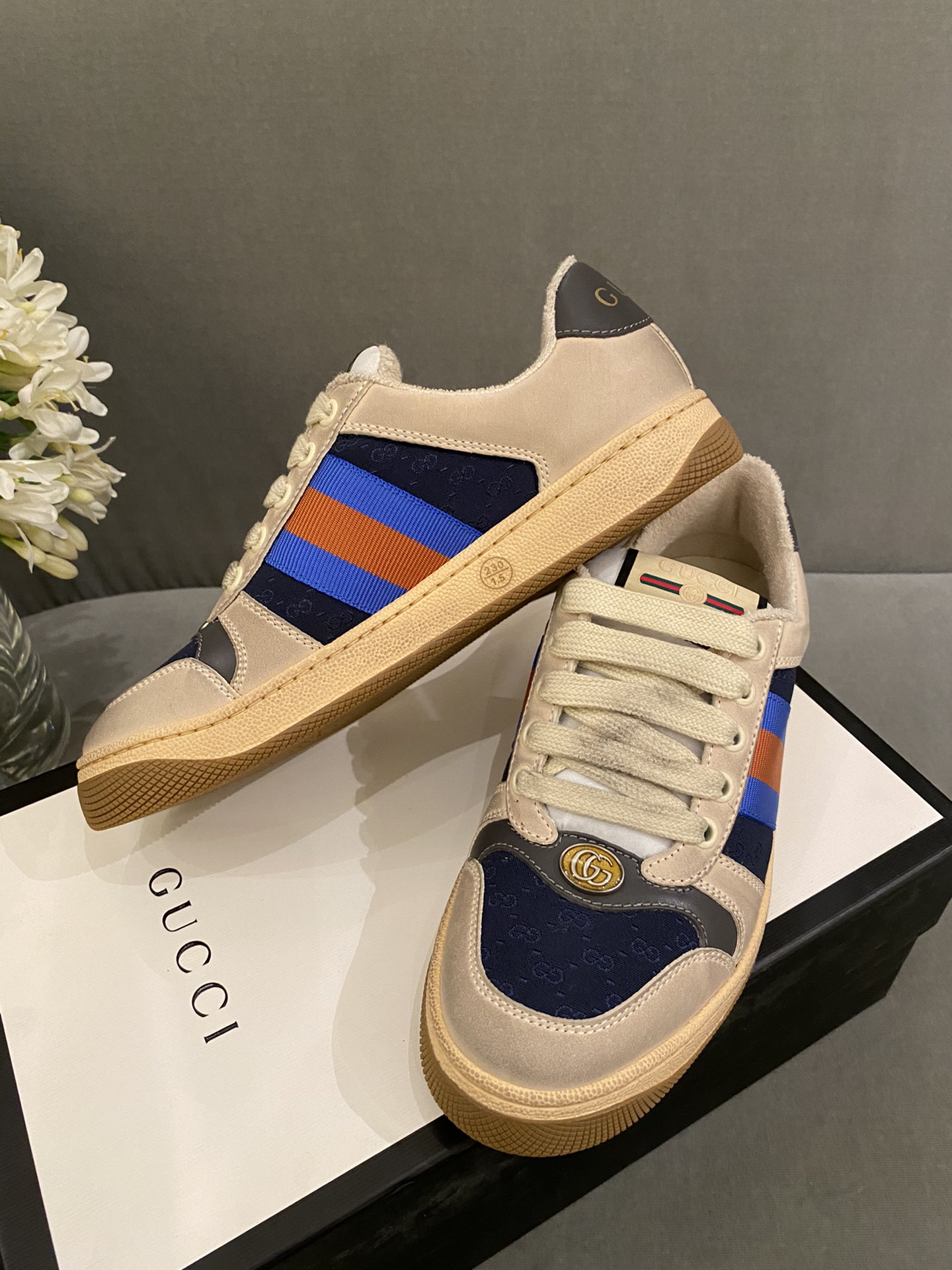 G*u*i sneakers