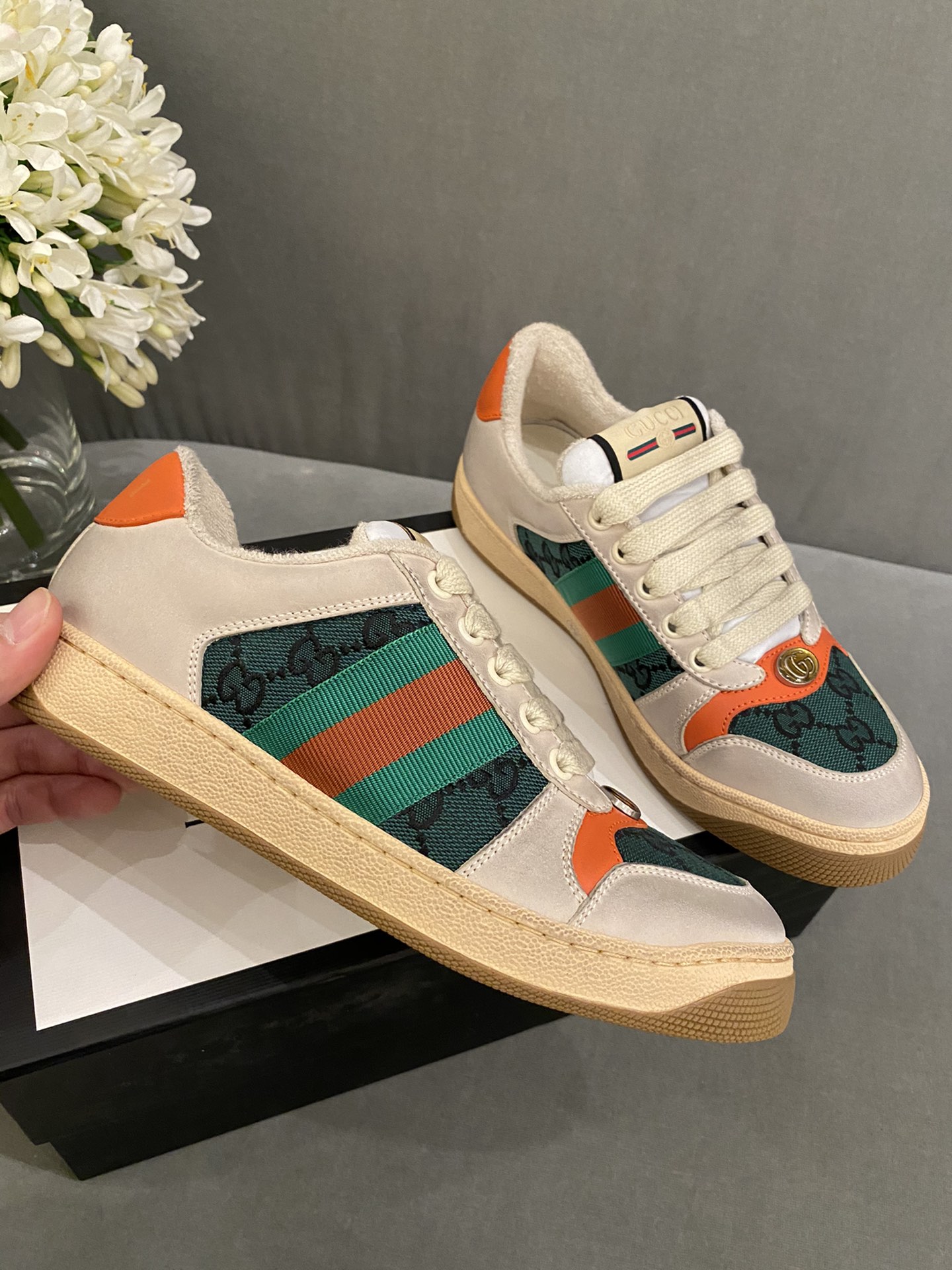 G*u*i sneakers