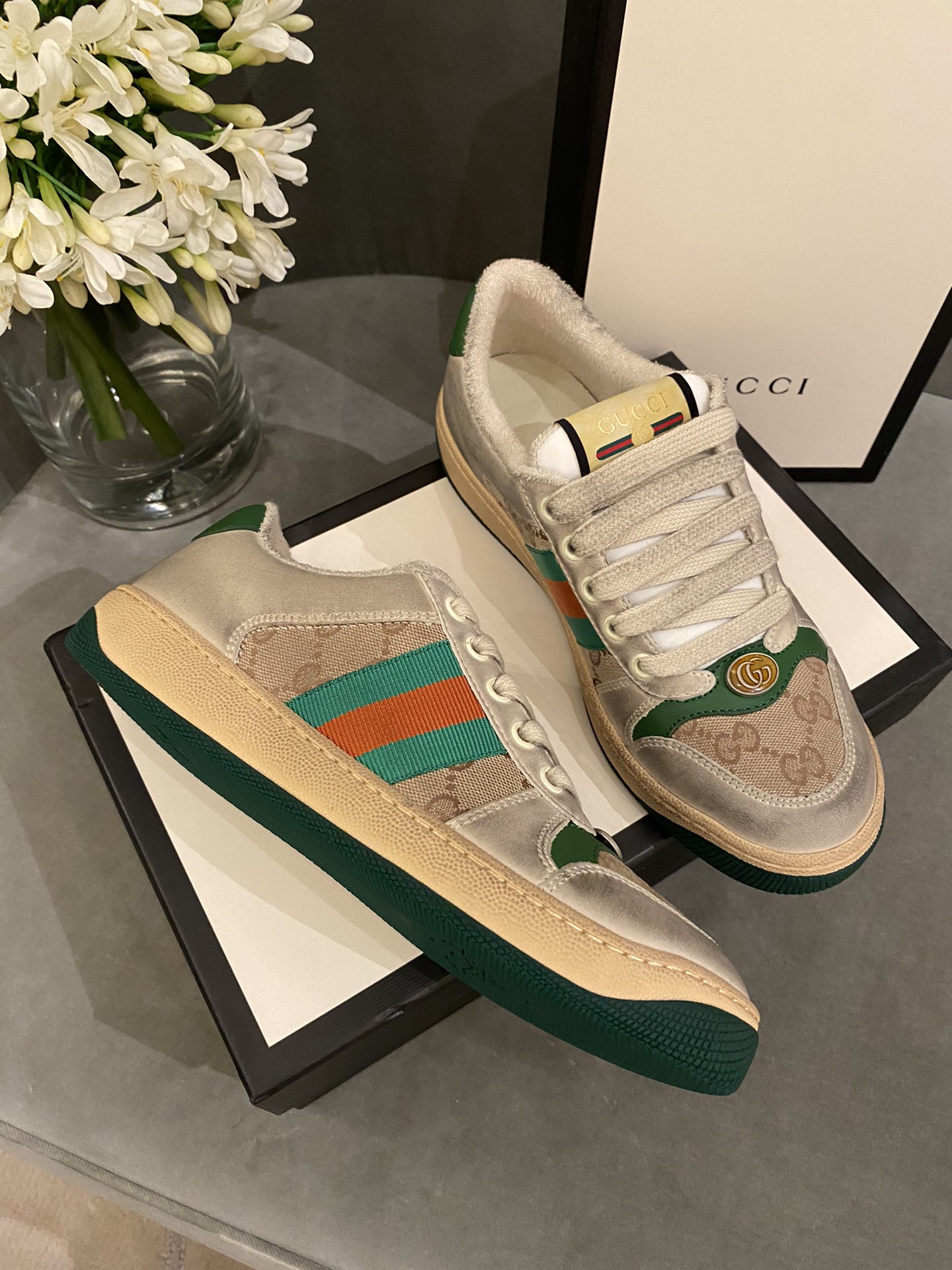 G*u*i sneakers