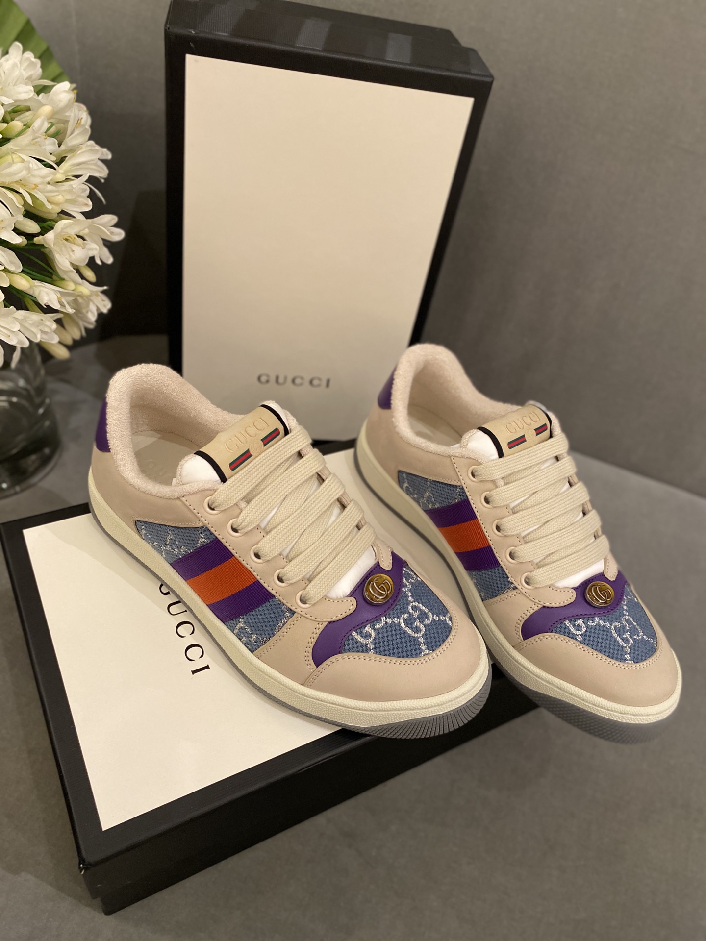 G*u*i sneakers