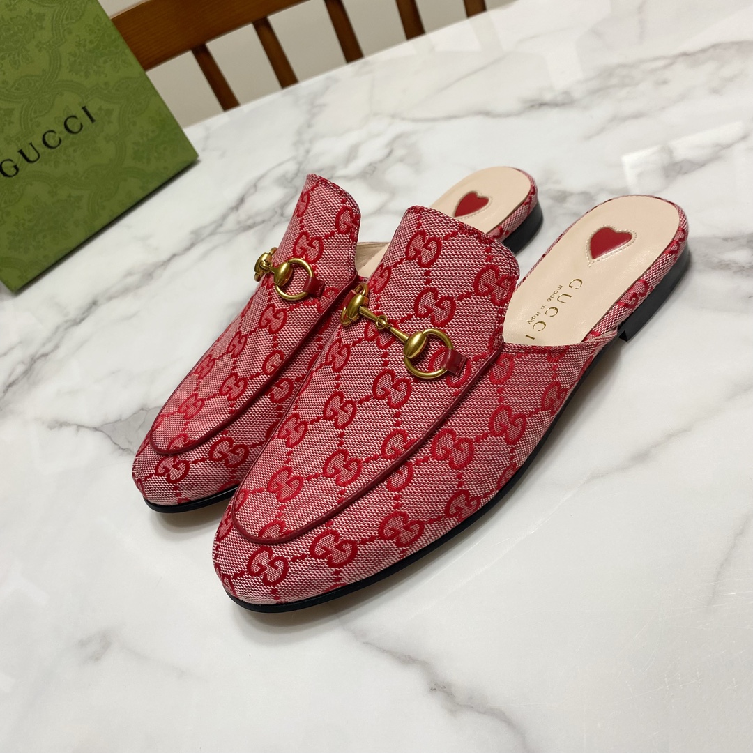 G*u*i loafers