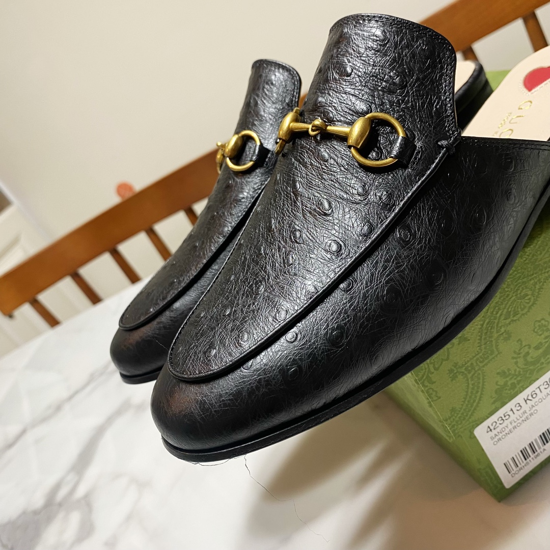 G*u*i loafers