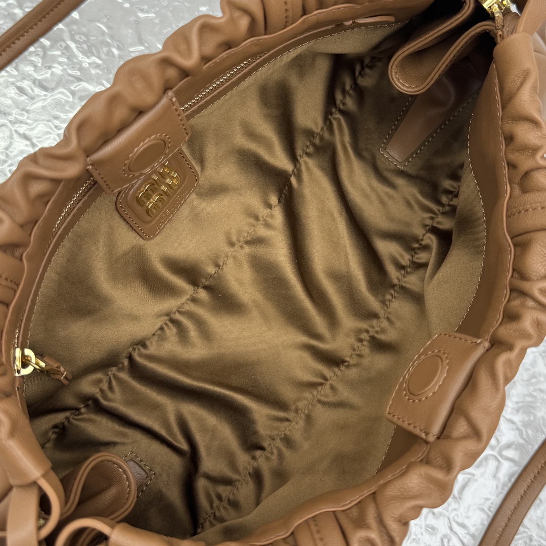 M*um*u leather hobo bag-35*18*9cm