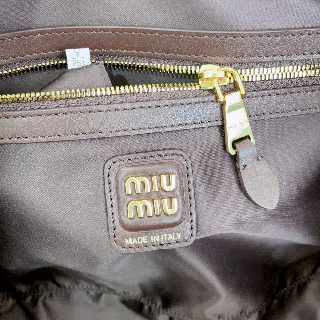 M*um*u leather top handbag-34x23x12cm