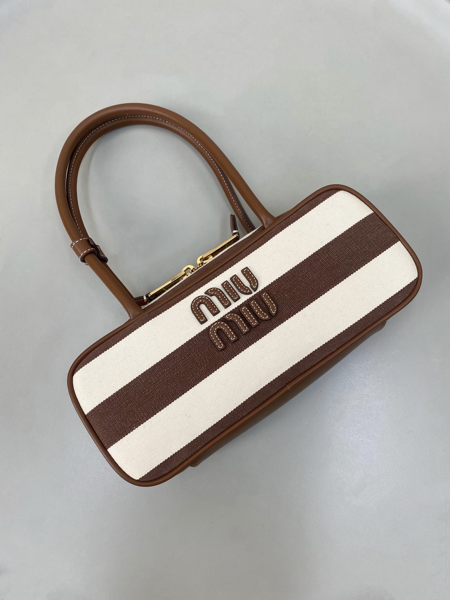 M1um1u beau top-handle tratan bag -27×12×9cm