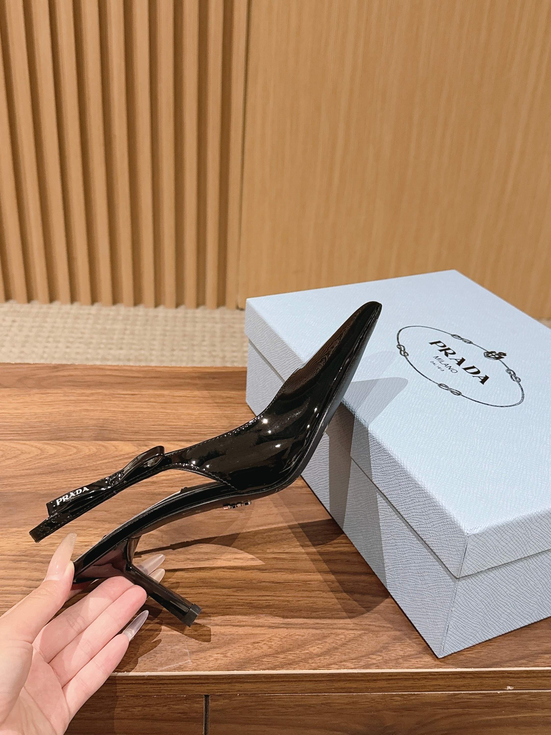 Pra*a Black Patent Leather Slingback Pumps