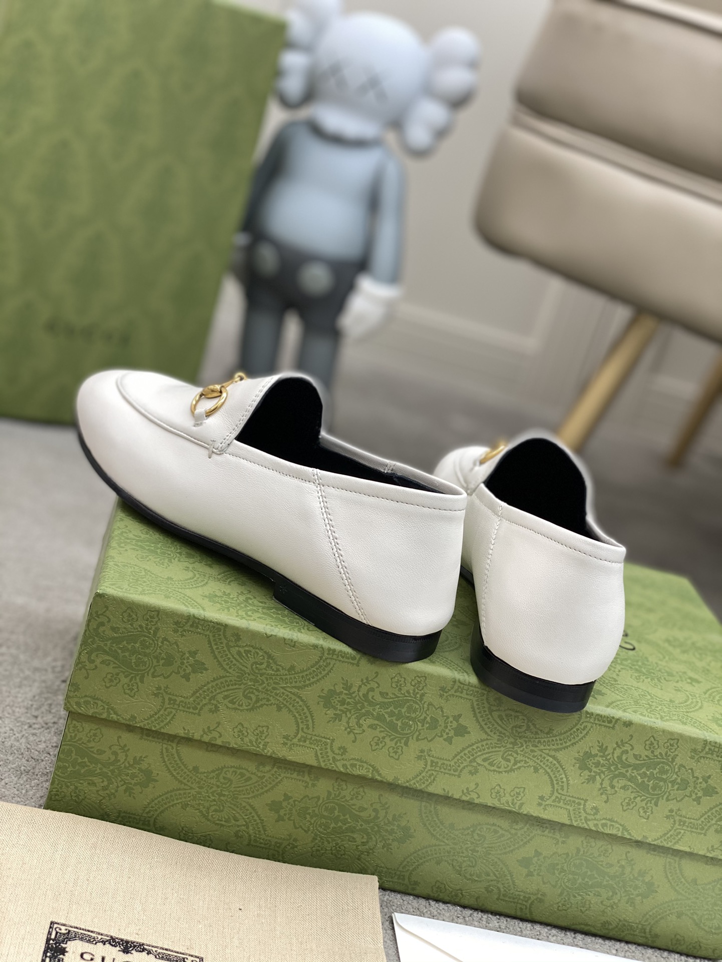 G*u*i loafers