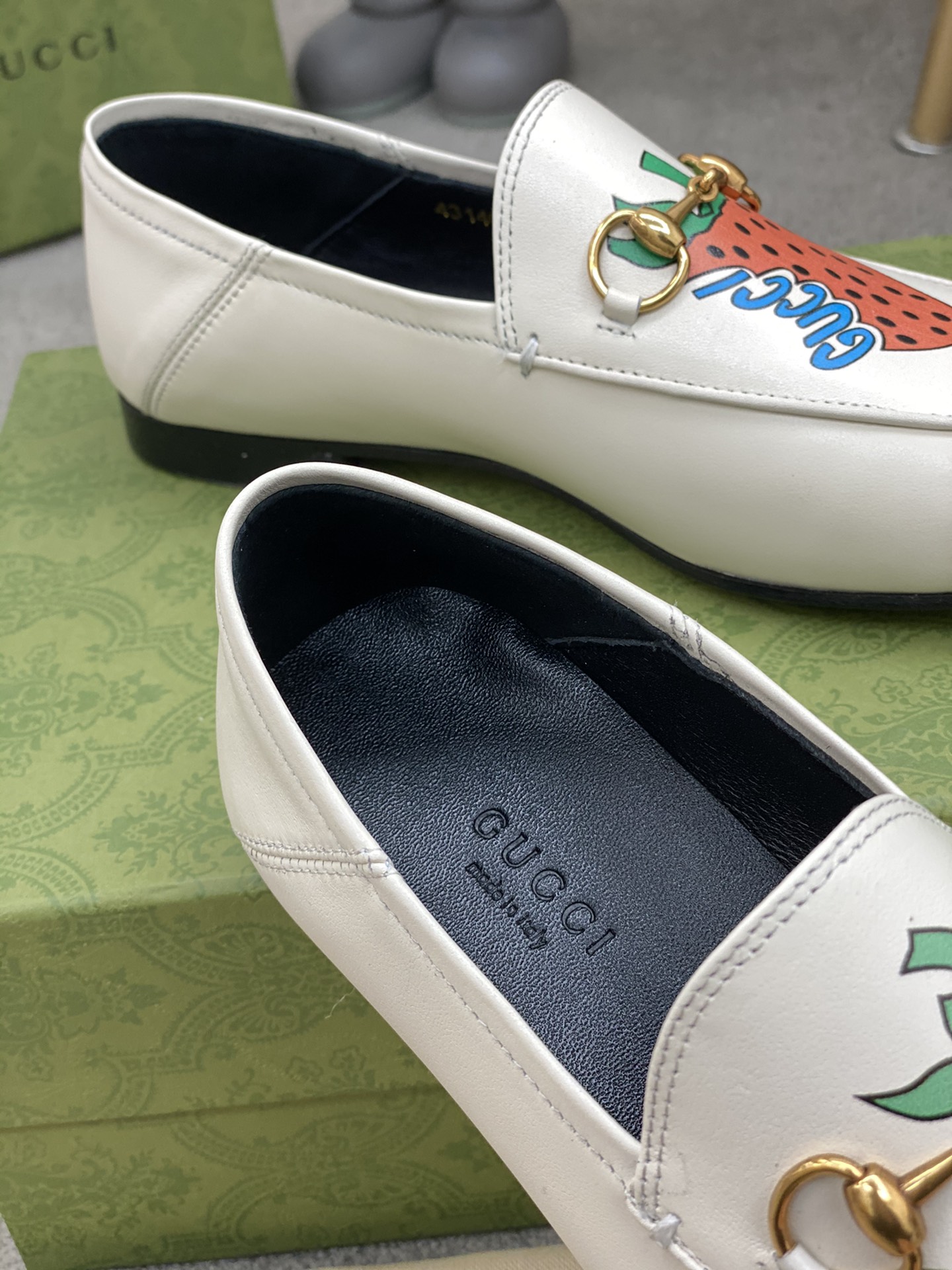 G*u*i loafers