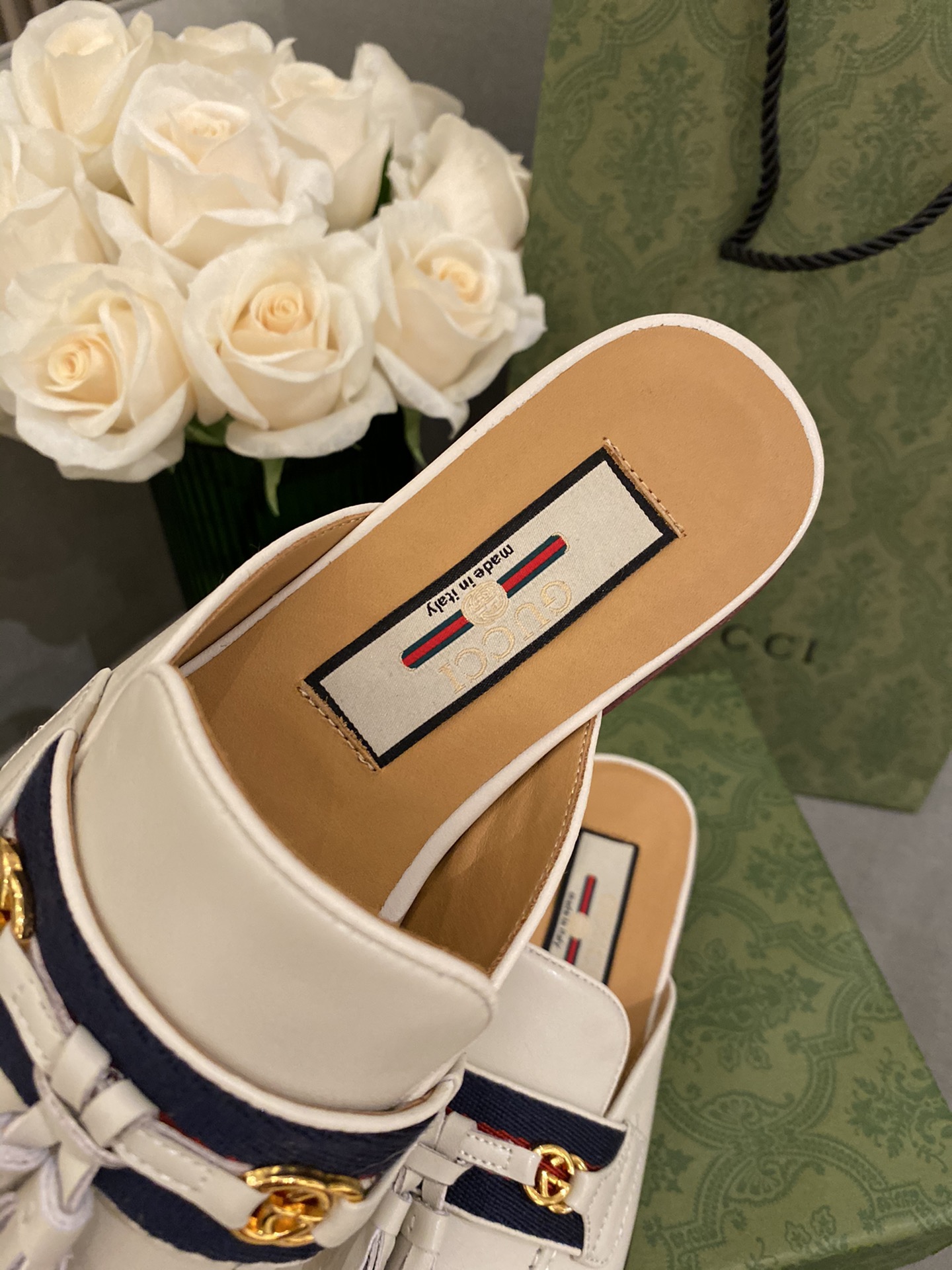 G*u*i loafers